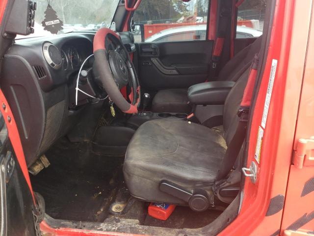 1C4BJWDG3DL669464 - 2013 JEEP WRANGLER U SPORT Orange Foto 7