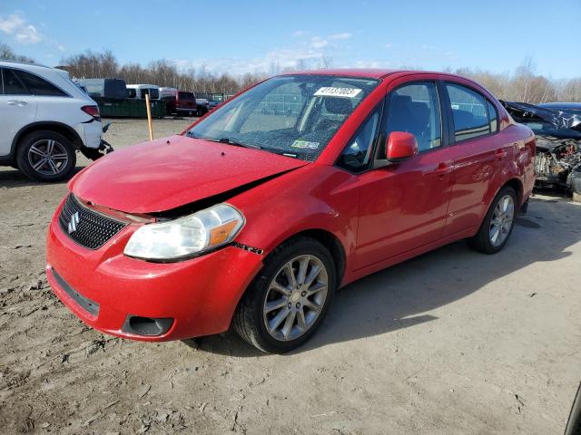 JS2YC5A28B6304058 - 2011 SUZUKI SX4 LE RED photo 1