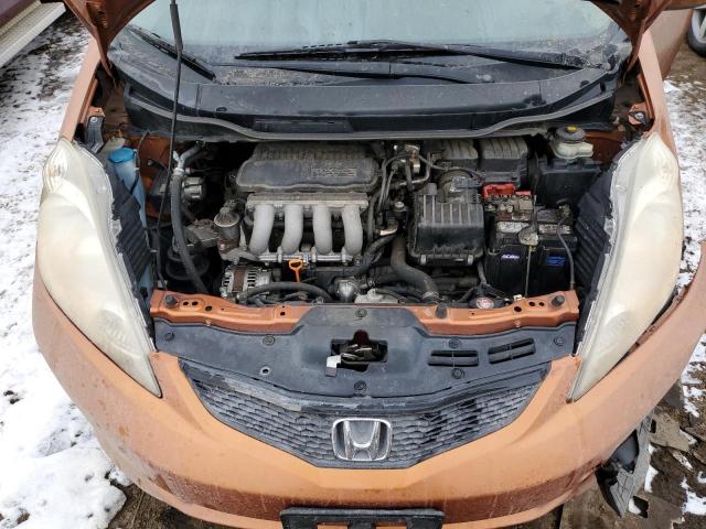 JHMGE88419S008579 - 2009 HONDA FIT SPORT ORANGE photo 11