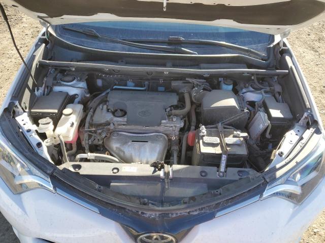 2T3BFREVXJW856144 - 2018 TOYOTA RAV4 LE WHITE photo 11