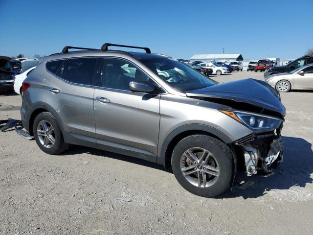 5NMZUDLB9HH050262 - 2017 HYUNDAI SANTA FE S SILVER photo 4