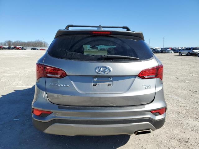 5NMZUDLB9HH050262 - 2017 HYUNDAI SANTA FE S SILVER photo 6