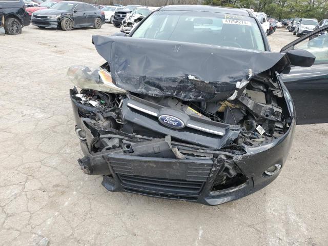 1FAHP3K24CL428502 - 2012 FORD FOCUS SE BLACK photo 11