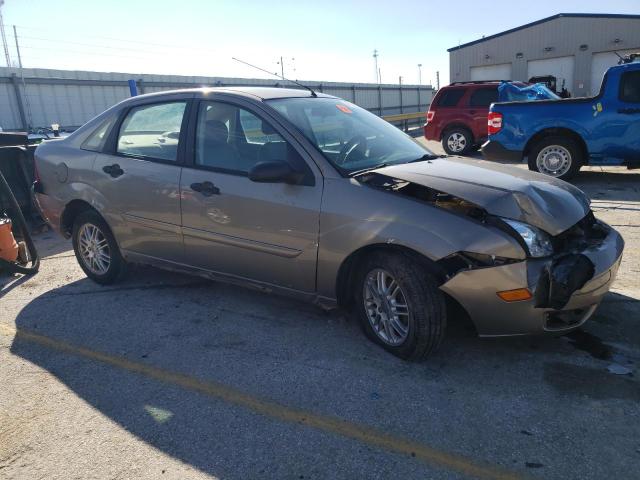 1FAFP34NX5W247243 - 2005 FORD FOCUS ZX4 TAN photo 4