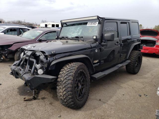 1C4HJWEG3EL210980 - 2014 JEEP WRANGLER U SAHARA BLACK photo 1