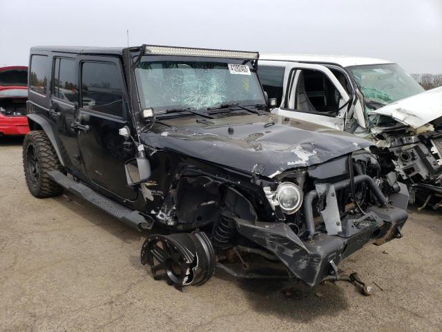 1C4HJWEG3EL210980 - 2014 JEEP WRANGLER U SAHARA BLACK photo 4