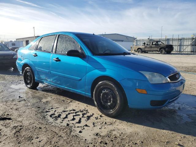 1FAHP34N07W241575 - 2007 FORD FOCUS ZX4 BLUE photo 4