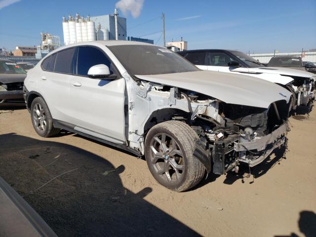 5UX33DT05P9P84705 - 2023 BMW X4 XDRIVE30I WHITE photo 4