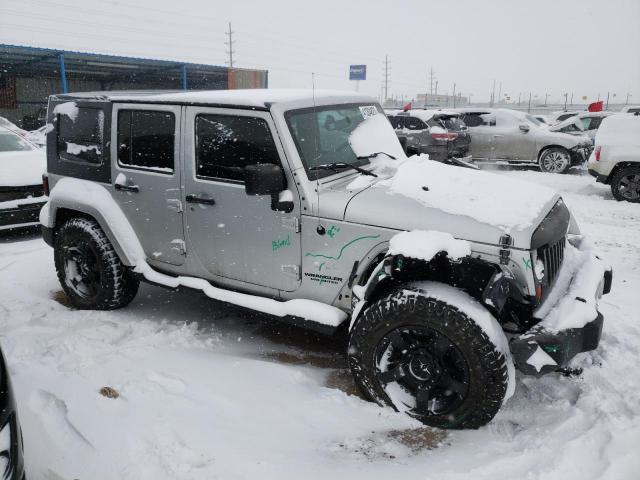 1J4BA5H10AL163631 - 2010 JEEP WRANGLER U SAHARA SILVER photo 4