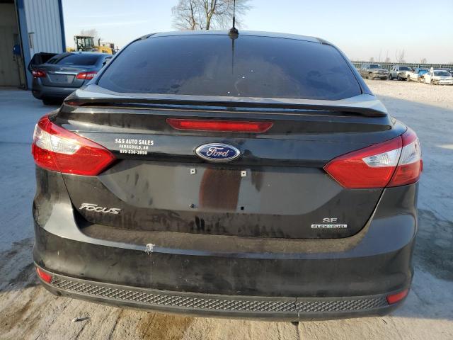 1FAHP3F27CL450486 - 2012 FORD FOCUS SE BLACK photo 6