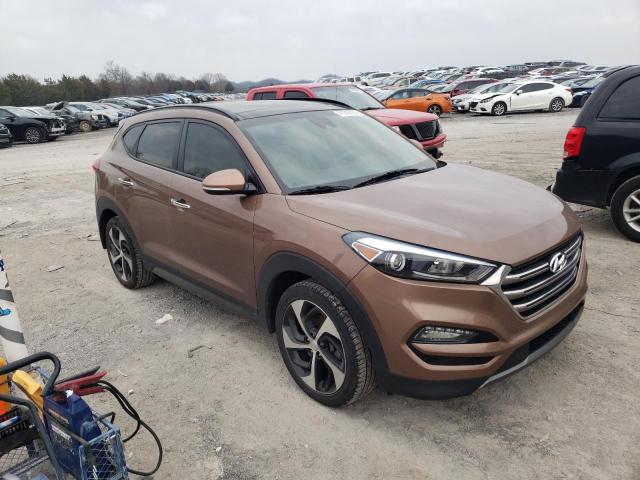 KM8J3CA28GU239792 - 2016 HYUNDAI TUCSON LIMITED BROWN photo 4