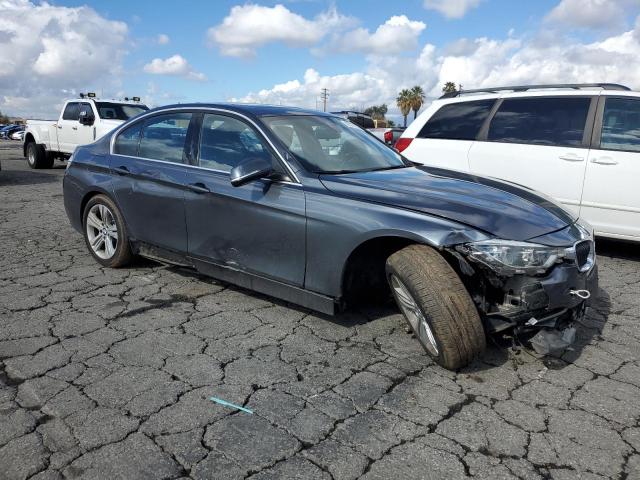 WBA8B9C59JK676684 - 2018 BMW 330 I GRAY photo 4