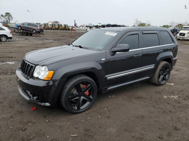 1J8HR78WX9C511388 - 2009 JEEP GRAND CHER SRT-8 BLACK photo 1