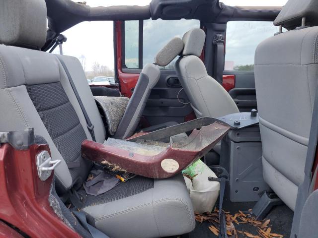 1J4HA5H17AL197527 - 2010 JEEP WRANGLER U SAHARA BURGUNDY photo 11