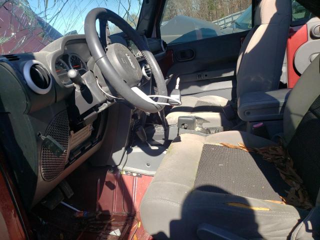 1J4HA5H17AL197527 - 2010 JEEP WRANGLER U SAHARA BURGUNDY photo 7