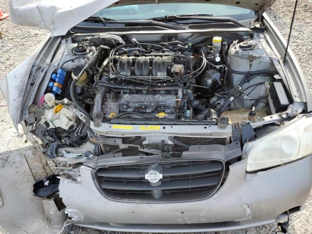 JN1CA31D7YT525034 - 2000 NISSAN MAXIMA GLE GOLD photo 11