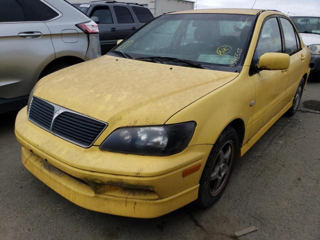 JA3AJ86EX2U032306 - 2002 MITSUBISHI LANCER OZ RALLY YELLOW photo 1