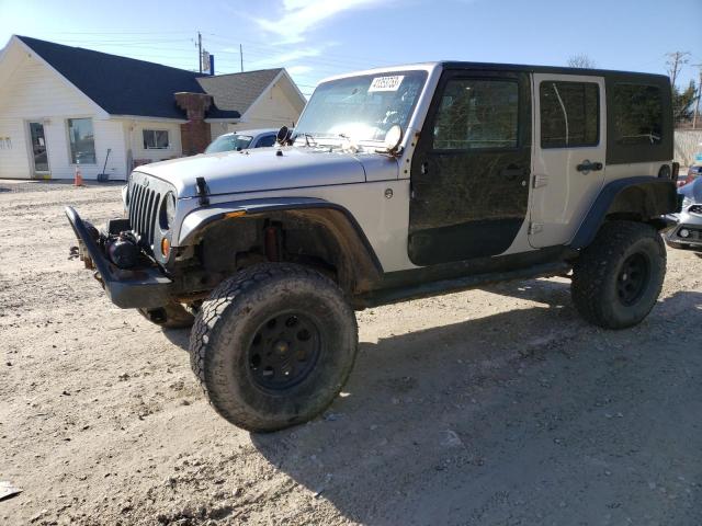 1J8GA59129L714477 - 2009 JEEP WRANGLER U SAHARA SILVER photo 1