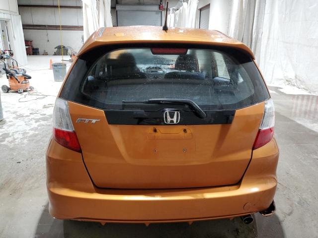 JHMGE88419S025303 - 2009 HONDA FIT SPORT ORANGE photo 6