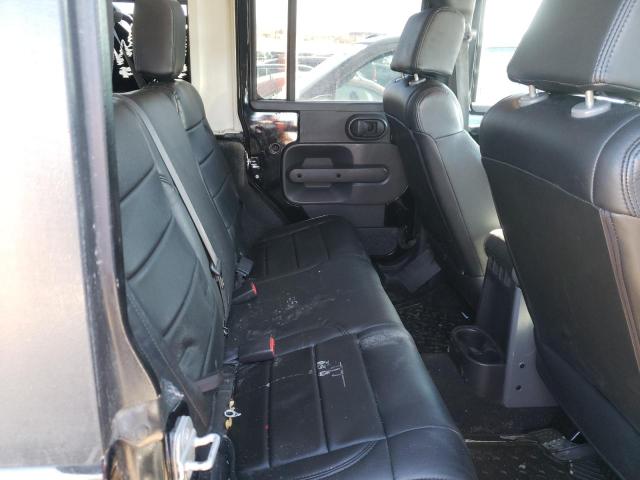 1J4HA5H19AL102577 - 2010 JEEP WRANGLER U SAHARA BLACK photo 11