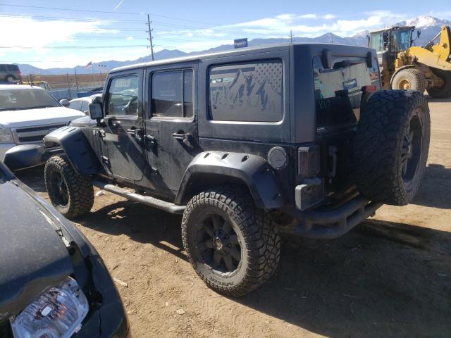 1J4HA5H19AL102577 - 2010 JEEP WRANGLER U SAHARA BLACK photo 2