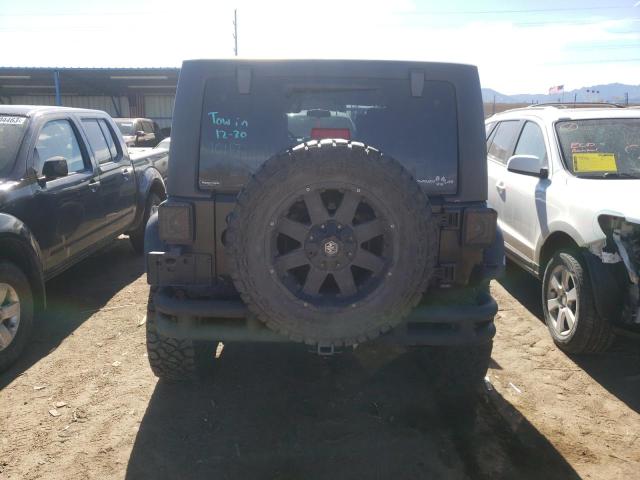 1J4HA5H19AL102577 - 2010 JEEP WRANGLER U SAHARA BLACK photo 6