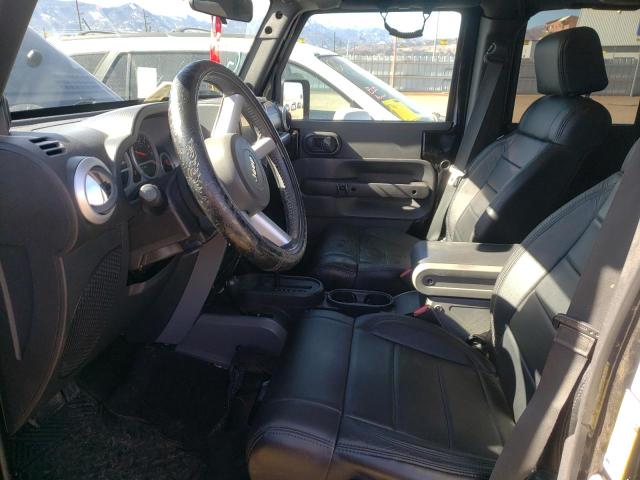 1J4HA5H19AL102577 - 2010 JEEP WRANGLER U SAHARA BLACK photo 7