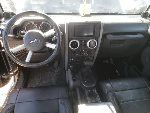 1J4HA5H19AL102577 - 2010 JEEP WRANGLER U SAHARA BLACK photo 8