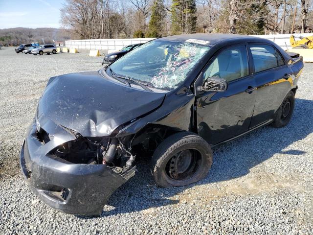 1NXBU4EE1AZ325528 - 2010 TOYOTA COROLLA BASE BLACK photo 1
