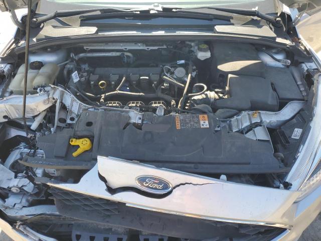 1FADP3F27JL310322 - 2018 FORD FOCUS SE SILVER photo 11