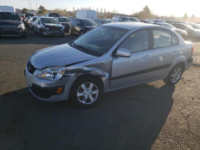 KNADE223496523924 - 2009 KIA RIO BASE SILVER photo 1