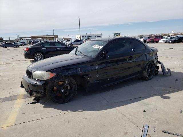 WBAUC9C55BVM09957 - 2011 BMW 1 SERIES I BLACK photo 1