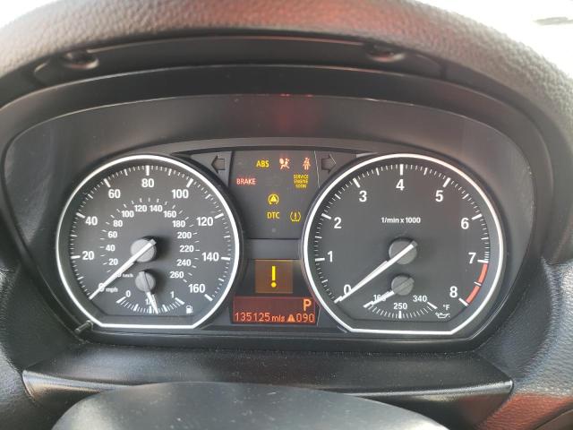 WBAUC9C55BVM09957 - 2011 BMW 1 SERIES I BLACK photo 9