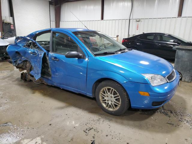 1FAFP34NX7W199696 - 2007 FORD FOCUS ZX4 BLUE photo 4