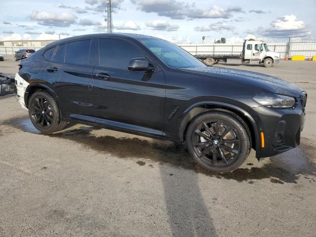 5UX33DT03P9R76978 - 2023 BMW X4 XDRIVE30I BLACK photo 4