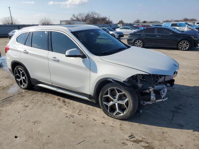 WBXHU7C55K5N39911 - 2019 BMW X1 SDRIVE28I WHITE photo 4