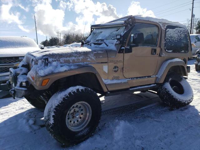 1J4FA59S1YP775493 - 2000 JEEP WRANGLER / SAHARA TAN photo 1