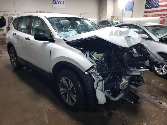 5J6RW2H22LL005768 - 2020 HONDA CR-V LX WHITE photo 4