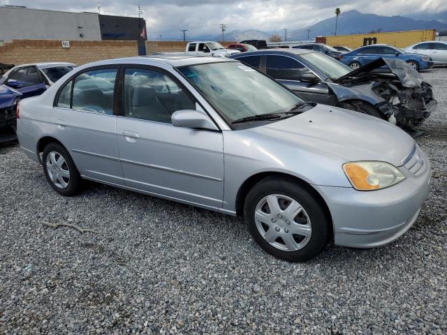 1HGES26802L060470 - 2002 HONDA CIVIC EX SILVER photo 4