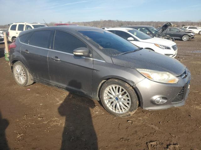 1FAHP3M2XCL357853 - 2012 FORD FOCUS SEL GRAY photo 4