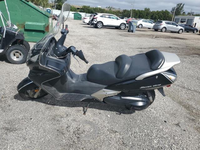 JH2PF0142CK900509 - 2012 HONDA FSC600 A BLACK photo 7