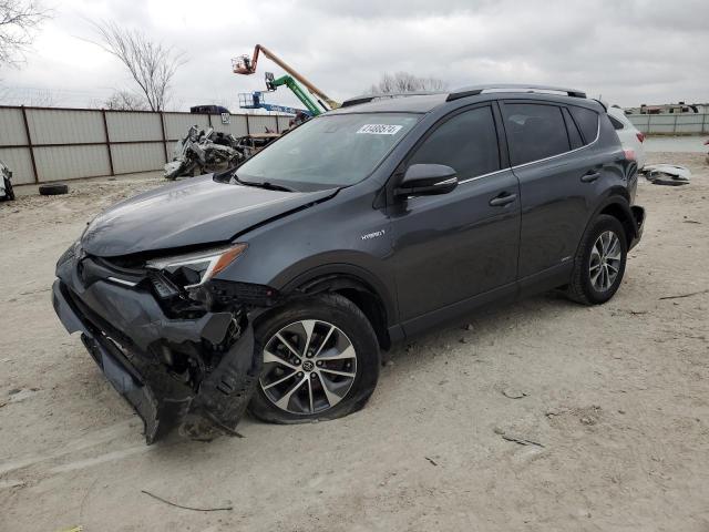 JTMRJREV7JD243165 - 2018 TOYOTA RAV4 HV LE CHARCOAL photo 1