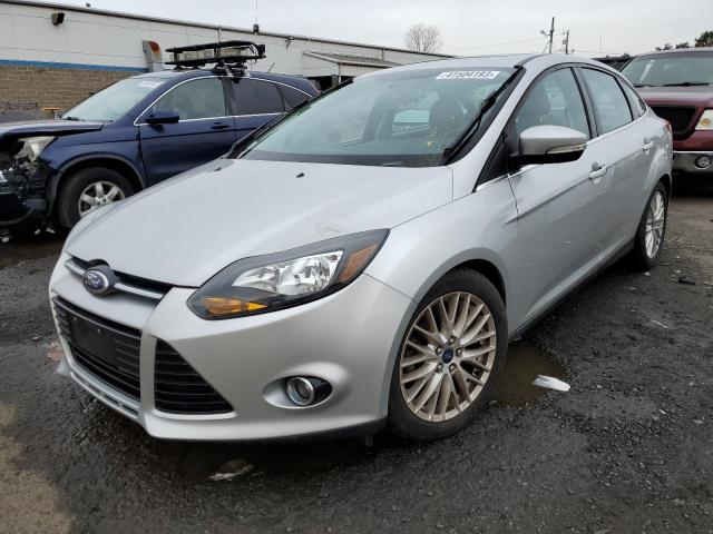 1FADP3J20EL232074 - 2014 FORD FOCUS TITANIUM SILVER photo 1