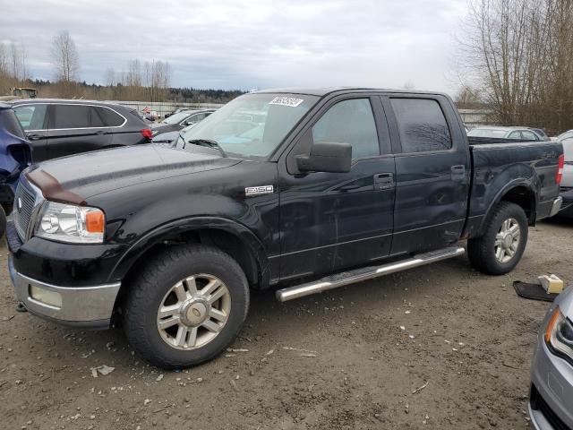 1FTPW14554KC46321 - 2004 FORD F150 SUPERCREW BLACK photo 1