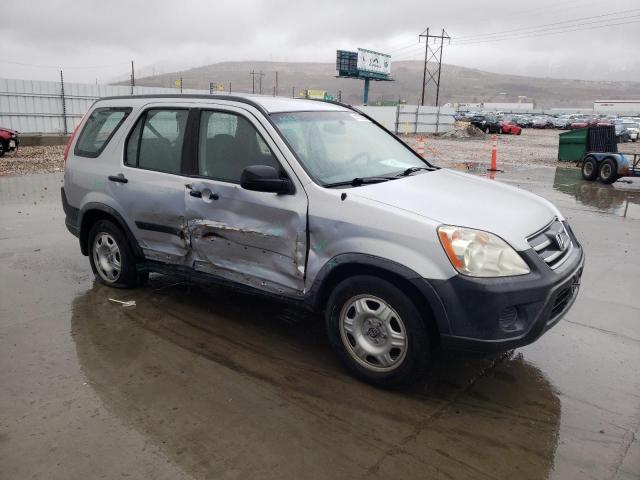 JHLRD78585C064560 - 2005 HONDA CR-V LX SILVER photo 4