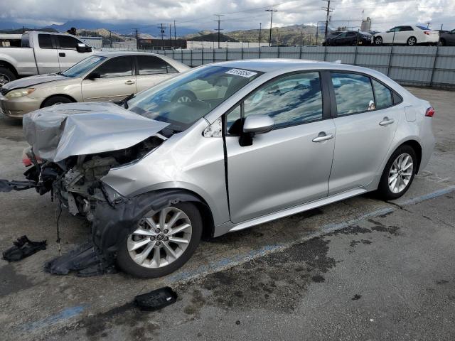 5YFVPMAE1MP154814 - 2021 TOYOTA COROLLA LE SILVER photo 1