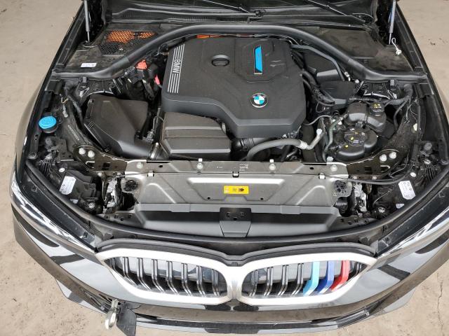 3MW39FF03P8D00335 - 2023 BMW 330E BLACK photo 11