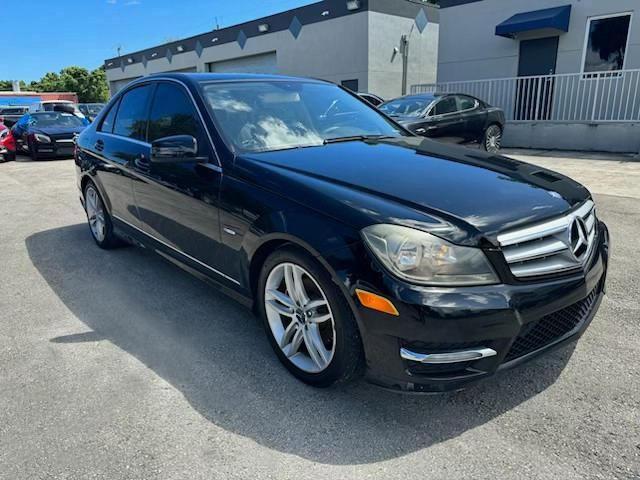 WDDGF4HB0CA644127 - 2012 MERCEDES-BENZ C 250 BLACK photo 4