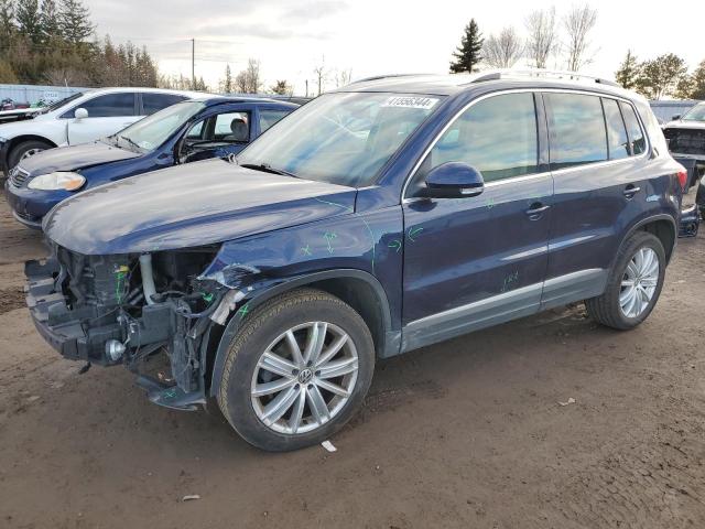 WVGJV3AX0EW548194 - 2014 VOLKSWAGEN TIGUAN S BLUE photo 1