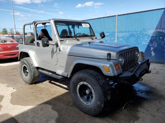 1J4FA49S6YP712853 - 2000 JEEP WRANGLER / SPORT SILVER photo 4